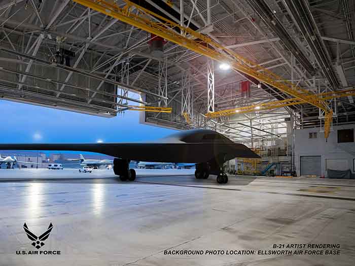 Representación artística de un B-21 Raider en un hangar de la Base de la Fuerza Aérea de Ellsworth, S.D., una de las futuras bases que albergarán el nuevo fuselaje. El Centro de Ingenieros Civiles de las Fuerzas Aéreas está dirigiendo un esfuerzo de construcción de 1.000 millones de dólares en la Base de las Fuerzas Aéreas de Ellsworth para proporcionar una infraestructura sostenible que satisfaga las demandas de potencia aérea de los bombarderos. (Gráfico de cortesía de las Fuerzas Aéreas de EE.UU. por Northrop Grumman)